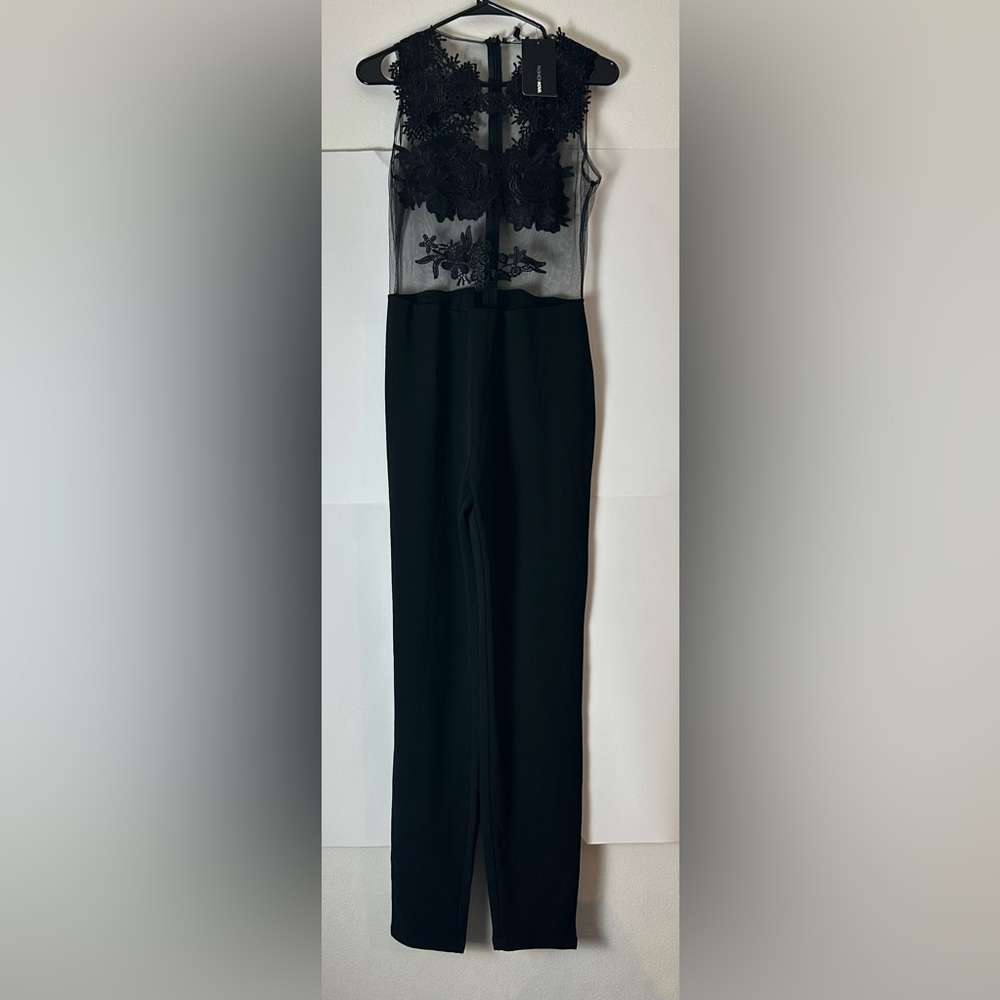 New Fashion Nova Black Jumpsuit with peek a boo sides